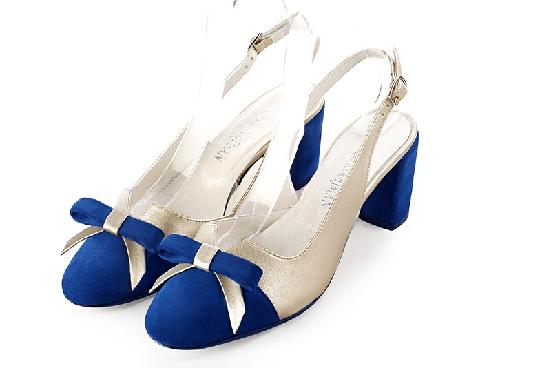 Electric blue and gold women's open back shoes, with a knot. Round toe. Medium block heels. Front view - Florence KOOIJMAN